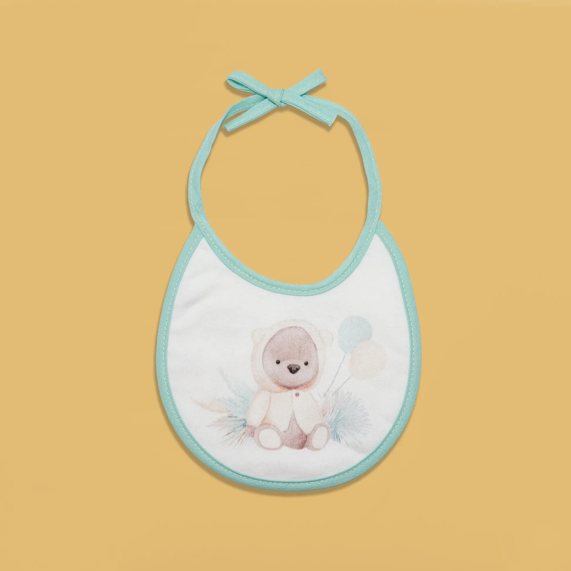 Babete com motivo ursinho com capuz verde