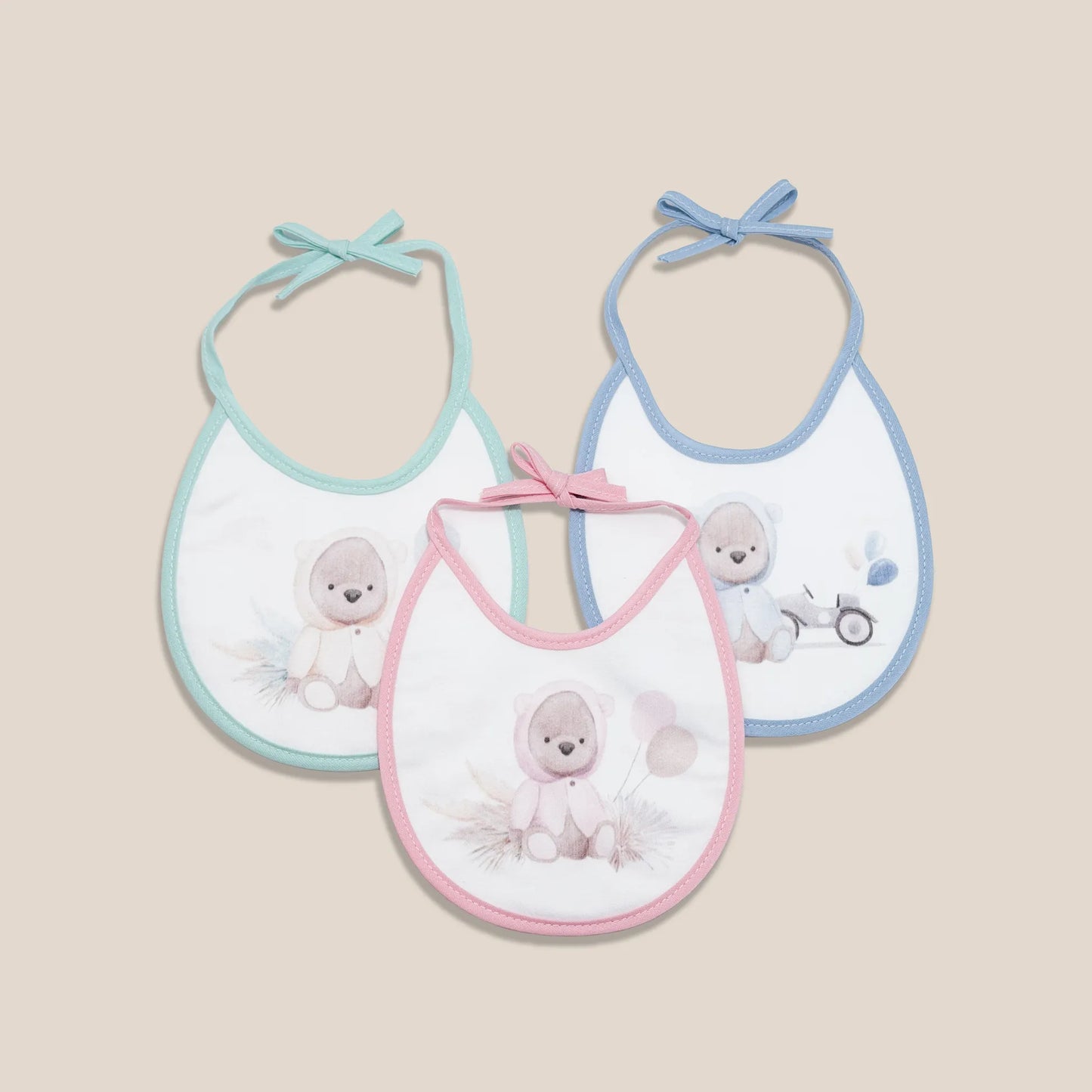 Babetes com motivo ursinho com capuz verde, rosa e azul