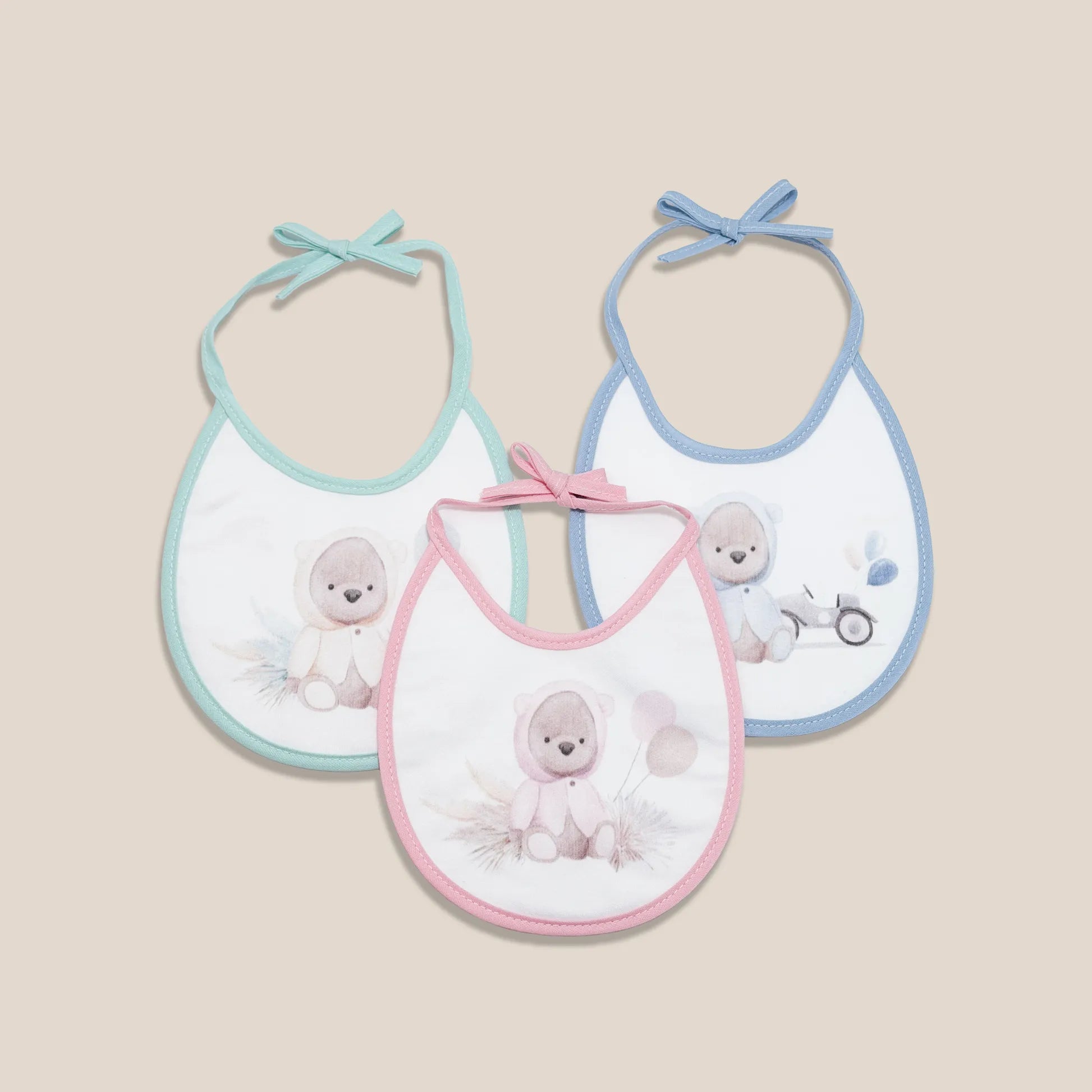 Babetes com motivo ursinho com capuz verde, rosa e azul