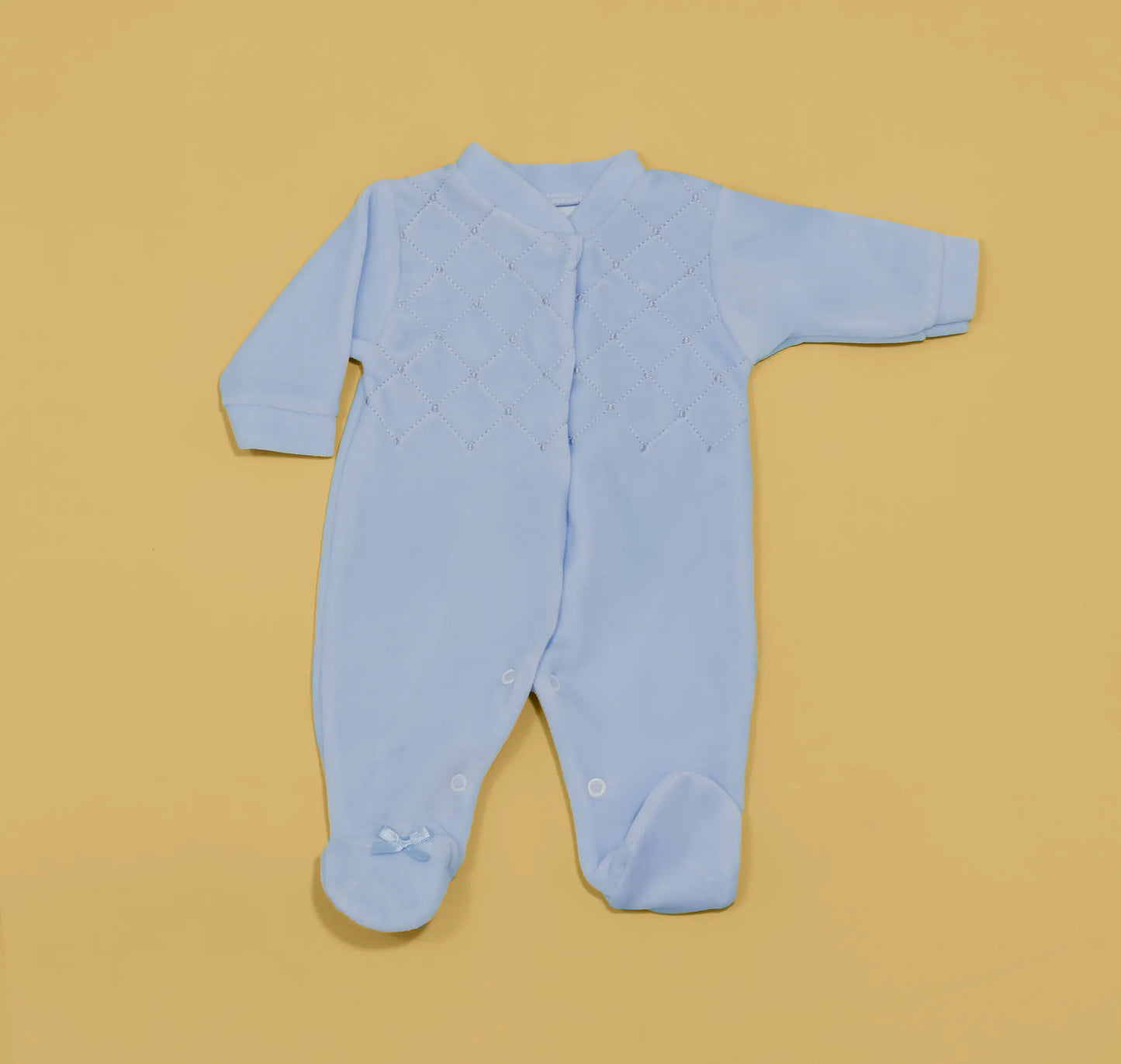 Babygrow de menino com bordado losangos azul
