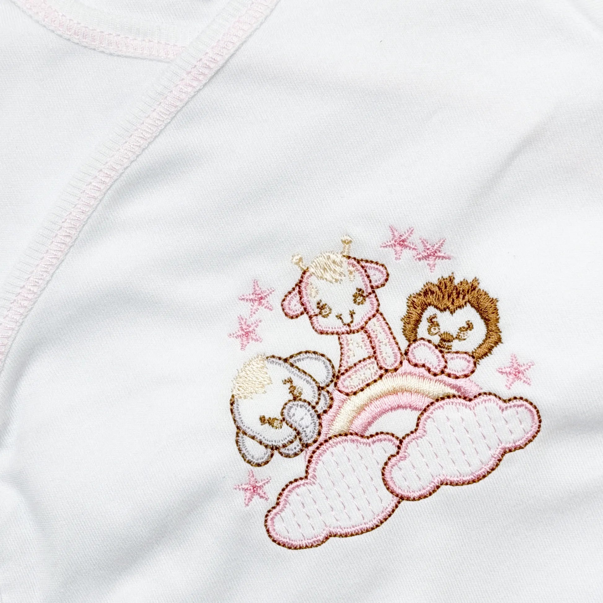 Pormenor de body de trespasse com collant com motivo animais no arco-íris rosa