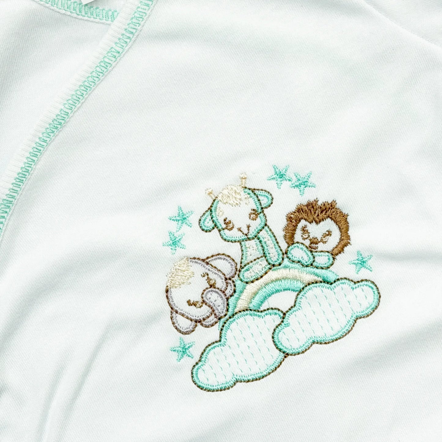 Pormenor de body de trespasse com collant com motivo animais no arco-íris verde