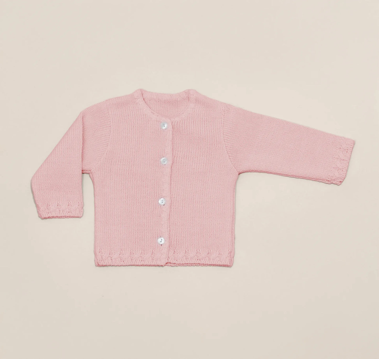 Casaco em tricot com pormenores trabalhados nas extremidades rosa