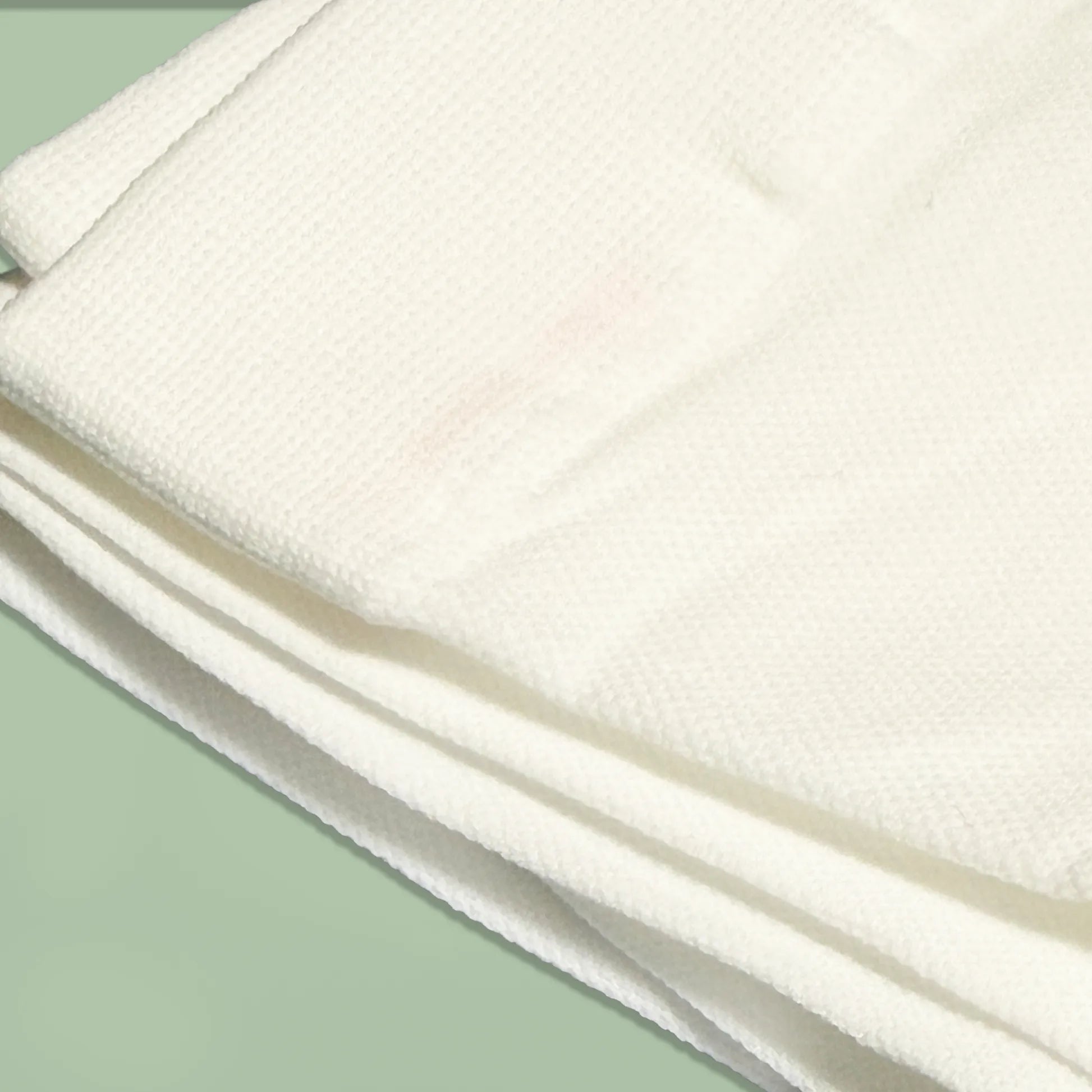 Pormenor de collant de microfibra opaco liso pérola