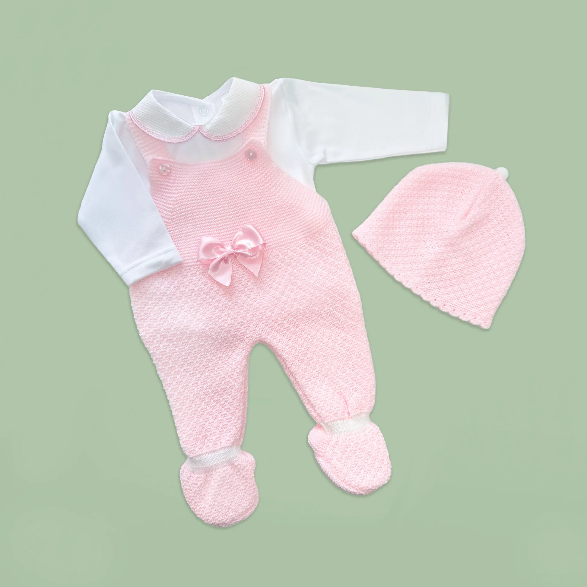 Conjunto de menina de jardineira com laço, camisola e gorro com pompom em tricot rosa