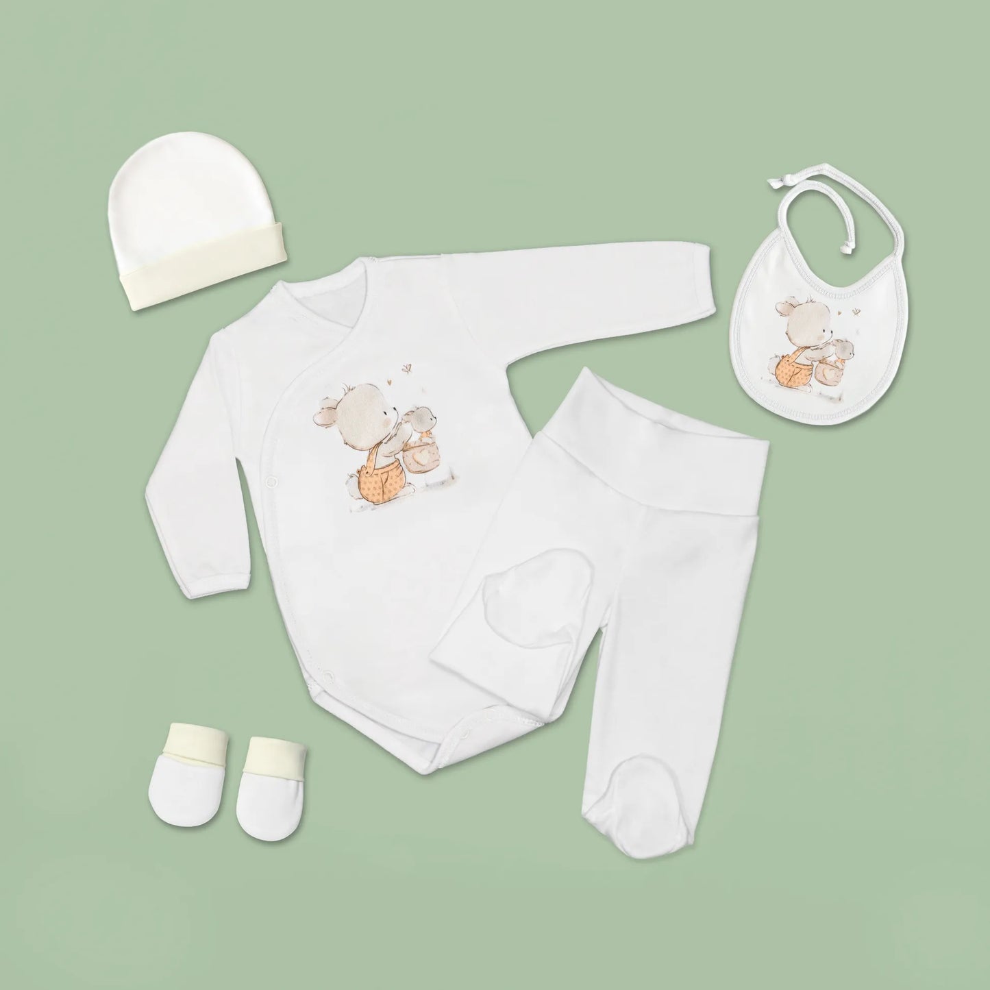 Conjunto de primeira roupinha com motivo coelhinho na cesta bege