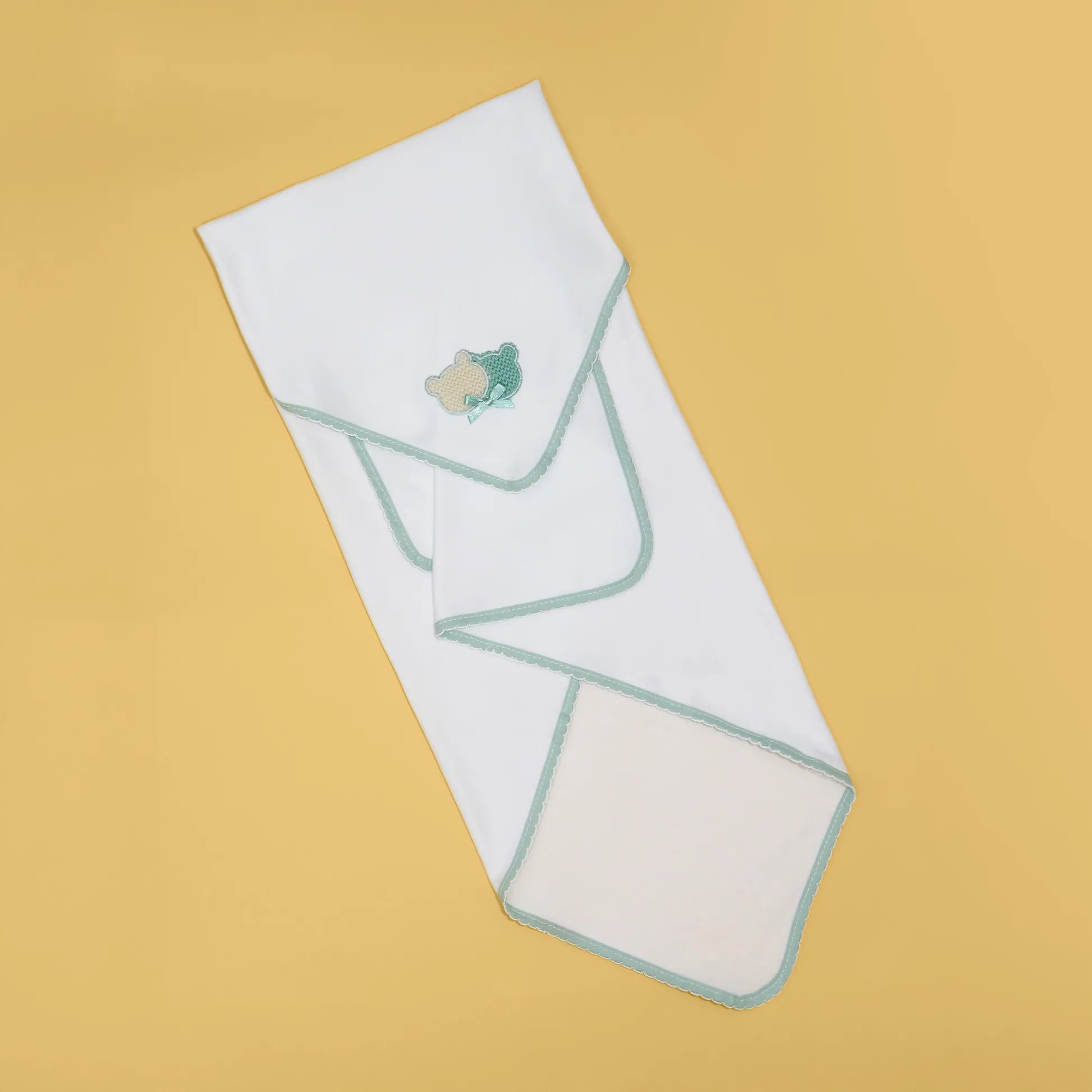 Fralda com motivo ursinhos tricot e lacinho verde