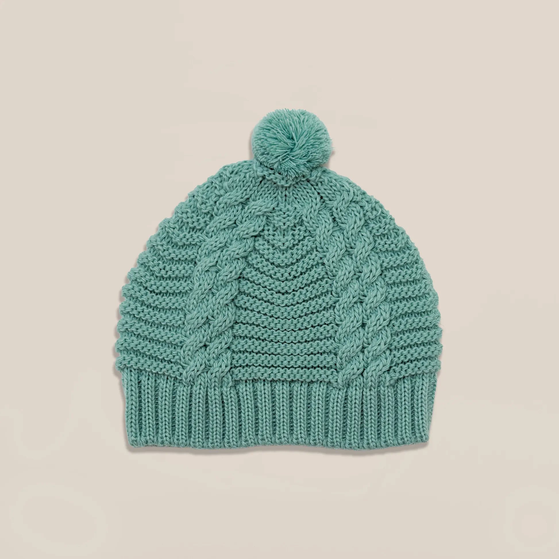 Gorro de malha tricotada com pompom verde