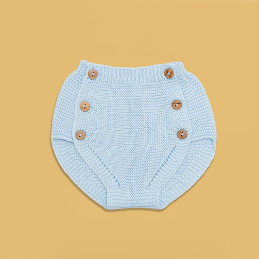 Tapa-fraldas de malha com botões de madeira azul