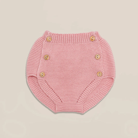 Tapa-fraldas de malha com botões de madeira rosa