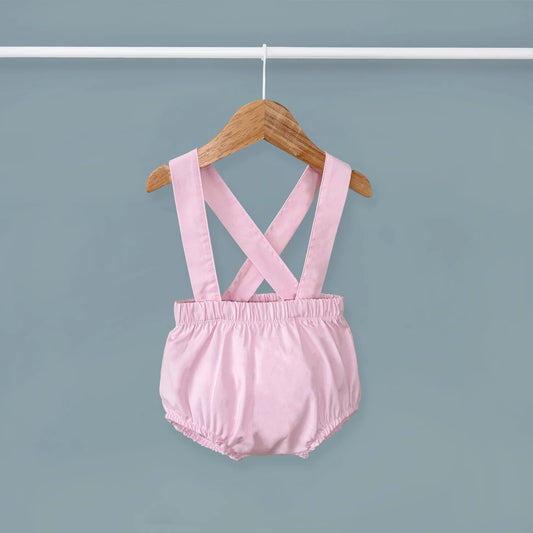 Tapa-fraldas em tecido liso com alças rosa