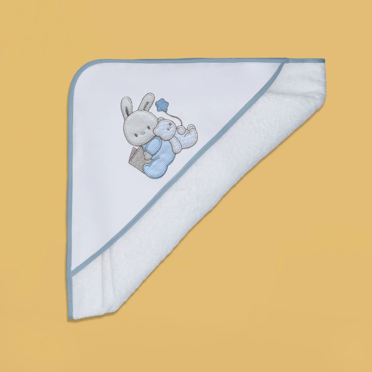 Toalha com motivo coelhinho e ursinho com livro azul